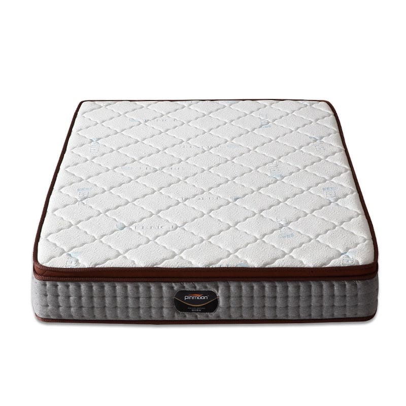 Rolled up sleepwell pocket spring gel memory foam mattress in a box