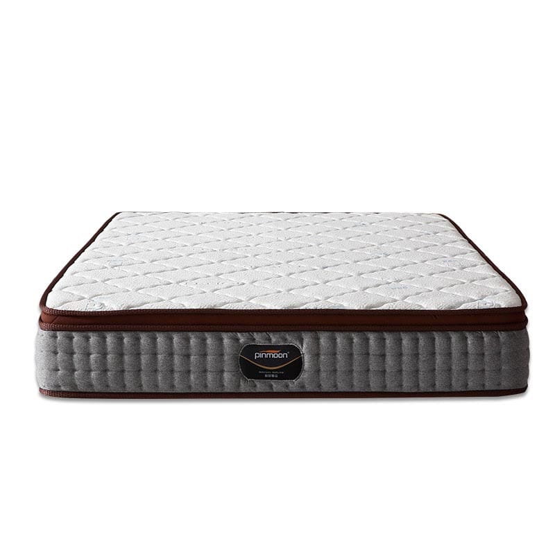 Rolled up sleepwell pocket spring gel memory foam mattress in a box