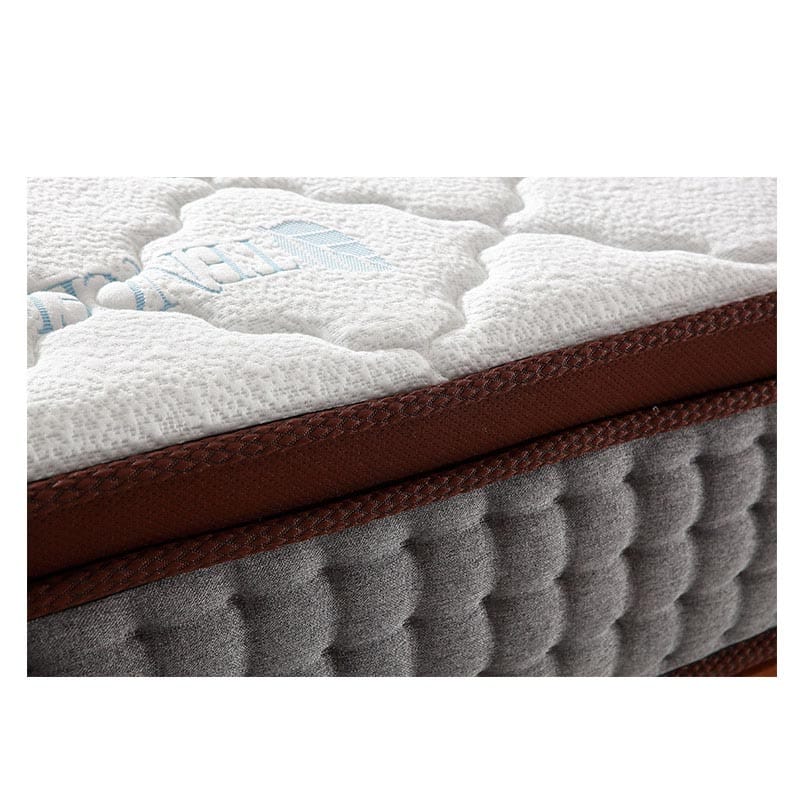 Rolled up sleepwell pocket spring gel memory foam mattress in a box